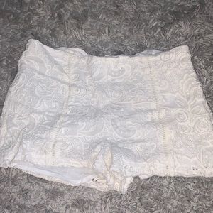 White lace shorts